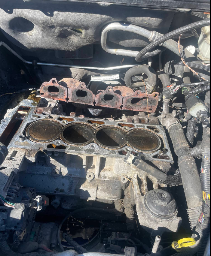 Engine block opened up for repair with the cylinder head removed